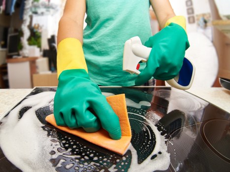 Careful inspection and stain treatment for a rug